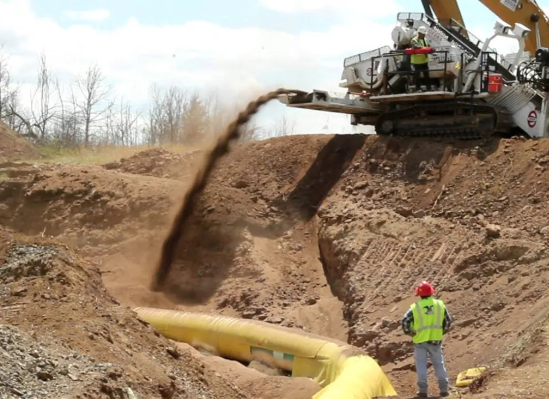 Excavator with pipeline